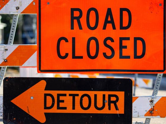Detour and road closed signs
